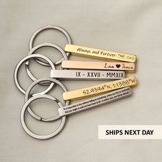 four personalized key chains with names and date engraved on them