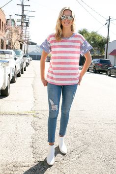 4TH OF JULY AMERICAN FLAG PRINT MIXED ROUND NECK SHORT SLEEVE TOP- MADE IN U.S.A. Style: CASUAL Print / Pattern: STRIPED Fit: REGULAR Neck Line: ROUND NECK Sleeve: SHORT SLEEVE Lining: NO Made In: Made In U.S.A Fabric Contents: 50% Polyester 38% Cotton 12% Rayon Non-sheer fabric Care Instructions: MACHINE WASH COLD, DO NOT BLEACH Casual Tops For 4th Of July With Relaxed Fit, Casual Relaxed Fit Tops For 4th Of July, Casual 4th Of July Short Sleeve Tops, Casual American Flag Print Short Sleeve Tops, Casual Short Sleeve Tops With American Flag Print, Casual Short Sleeve Tops For 4th Of July, Casual Cotton Tops For 4th Of July, American Flag Print Short Sleeve Top For Spring, American Style Flag Print Short Sleeve Top