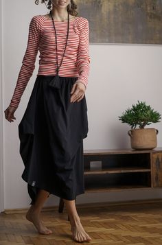 Long cotton skirt Fall in black color captivates with an interesting form and pleasant knitwear, from which it is sewn  The skirt is unique and comfortable and the unusual cut adds to its charm  The belt of the skirt is on an elastic band  The model is 176 cm tall and wears size S  Sizes: S M and L  Dimensions: belt (before and after stretching)  S- 62-88cm M- 66-94 cm L- 72-100 cm  skirt length in the longest place about 88 cm  Material:  cotton 100% Long Cotton Skirt, Boho Rock, Boho Skirts, Long Maxi, Fall Skirts, Summer Skirts, Gray Skirt, Cotton Skirt, Black Skirt