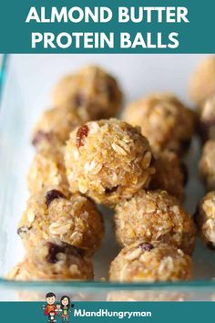 almond butter protein balls stacked on top of each other in a glass bowl with text overlay