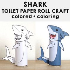 two toilet paper roll crafts with sharks on them