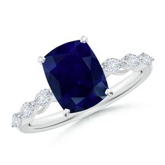 a cushion shaped blue sapphire and diamond ring