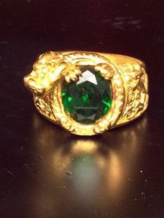 This is a perfect and unique magic ring made of green emerald stone, Gold 18K, the power of the ring is enhance the power of protection, good luck, charm, wealth and fortune to the wearer.  The ring showcases an elegant design with rare style amulet ring. It is great to get this ring for your loved one or treat yourself for a classic timeless style. Ring Name: Green Emerald Gold 18K Ring Ring Size: 10 Stone Type: Green Emerald Stone  Metal Type: Gold 18K, Stainless Power: Lucky and Charm Weight: 2010 Grams This item is only one left. Green Birthstone Ring For Spiritual Occasions, Green Spiritual Birthstone Rings, Spiritual Green Birthstone Ring, Spiritual Gold Emerald Ring, Spiritual Gold Emerald Ring With Gemstone, Gold Emerald Ring With Spiritual Style, Collectible Gold Emerald Gemstone Ring, Collectible Gold Emerald Ring With Gemstone, Gold Emerald Ring Collectible