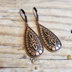 Antiqued Copper Filigree Teardrop Earrings Just got in! These teardrops are amazing in their elegant simplicity!! Gorgeous copper work. I hung simply on  either antiqued copper (plated brass for strength) leverback wires or artisan antiqued copper french hooks.   You may be attracted to the more slender pair in the second to the last image. See more about that pair of earrings here, https://www.etsy.com/listing/1302674323/antiqued-copper-long-dangle-teardrop  I also have the same style in antiqu Metal Teardrop Earrings With Lever Back, Vintage Copper Teardrop Earrings, Vintage Nickel-free Teardrop Earrings, Teardrop Earrings With Lever Back Ear Wires, Elegant Copper Teardrop Earrings, Vintage Teardrop Drop Earrings With Ear Wire, Nickel-free Copper Dangle Teardrop Earrings, Bohemian Teardrop Earrings With Lever Back, Metal Teardrop Dangle Earrings With Lever Back