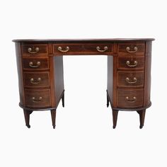 an antique wooden desk with two drawers and one drawer on the top, against a white background