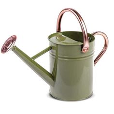 a green watering can with a pink handle