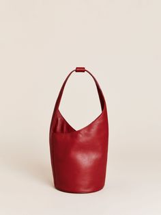 Extra baggage. Shop the Small Silvana Bucket Bag, a sustainable bag from Reformation. Lip Balm Collection, Sustainable Bag, Friends With Benefits, Black Friday Sale, Egift Card, New Bag, Leather Working, Magnetic Closure, New Shoes