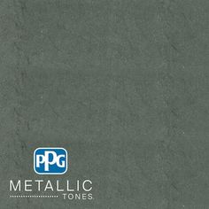 the logo for metallic tones is shown in blue and white on a dark gray background