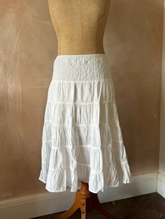 Vintage White Cotton Skirt  Clean and white Elastic waist Half lining  Cotton Fits Up to UK 10  Good condition White Tiered Lined Skirt, White Tiered Skirt With Gathered Details, White Fitted Maxi Skirt With Elastic Waistband, Relaxed White Skirt With Elastic Waistband, White Flared Mini Skirt With Elastic Waistband, White Ruffled Full Skirt Bottoms, White Fitted Ruffled Maxi Skirt, White Gathered Relaxed Skirt, White Relaxed Gathered Skirt