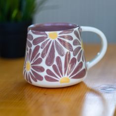 🌸 Flowers Coffee Mug - Handmade Large Mug for Your Cozy Coffee Moments 🌿 ✨ Sip Your Favorite Beverages in Style with this Beautifully Handcrafted Floral Mug ✨ Indulge in the enchanting beauty of our Flowers Coffee Mug. This exquisite handmade large mug is adorned with delicate floral patterns, bringing a touch of elegance and nature's charm to your daily coffee or tea routines. 🌿 Handcrafted Elegance: Each mug is lovingly handcrafted, showcasing the artistry and attention to detail that goes Different Pottery Ideas, Pottery With Flowers On It, Pottery Painting Tea Cup, Intricate Pottery Painting, Ceramic Painting Patterns, Handmade Coffee Mug, Glaze Patterns Ceramic Art, Simple Mug Painting, Flower Painted Pottery