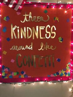 there is a sign that says, there is kindness around like confetti on it