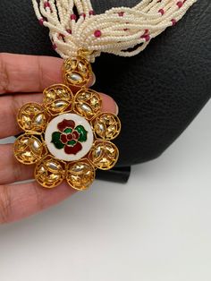 Small Pearl Rani Haar with Kundan Floral Pendent with matching earringsColor : Pearl WhiteSize : Mala Length : Approx 22 Inches; Earrings Length : 1 InchesStones : Kundan Red Stone AD Pearls Pearl Rani Haar, Pearl Mala, Rani Haar, Red Stone, Social Events, Indian Jewelry, Pearl White, Statement Necklace, Stone