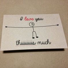 a piece of paper that says i love you, thinis much with a stick figure on it