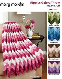 a crocheted afghan is shown in many colors