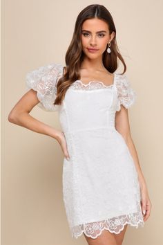 You'll bring the sweetest energy to the event in the Lulus Lovely Direction White Floral Embroidered Puff Sleeve Mini Dress! Lightweight woven organza features allover floral embroidery as it shapes short puff sleeves with elastic at the cuffs and shoulders. Scalloped details lends a sweetheart-inspired effect to the squared neckline, all atop a seamed bodice with a fitted waist. Figure-skimming A-line skirt finishes at a scalloped mini hem. Hidden zipper at side. Fit: This garment fits true to Cute Graduation Dresses, High School Graduation Dress, White Halter Midi Dress, Graduation Dress High School, Lacy White Dress, Squared Neckline, Bridal Shower Outfit, Puff Sleeve Mini Dress, Graduation Dresses