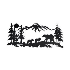 a bear and her cubs are silhouetted against the backdrop of a mountain range with pine trees