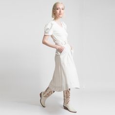 Look effortlessly chic in our western inspired Dramen cowboy ivory boots (off white). Pair them with tucked in jeans, mini skirts, and basics fall jackets. ETHICALLY HANDMADE IN COLOMBIA BY STIVALI NEW YORK MATERIALS Upper napa leather Textile lining Rubber outsole FEATURES Western boots Semi-pointed toe Stacked leather-wrapped heel Generational artisanal stitching MEASUREMENTS Heel height: 2"; 5cm • All measurements are based on a size 37 shoe. There may be slight measurement variations based o White Western Boots With Leather Sole, White Cowboy Boots Mid Calf, Fitted White Western Mid-calf Boots, Western White Snip Toe Knee-high Boots, Western Style White Mid-calf Boots Medium Width, Fall Jackets, Western Boots, Smooth Leather, Cowboy Boots