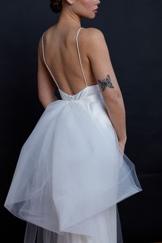 Stunning oversized bow belt in tulle with a silk satin sash. Use it as a fashion statement, as a belt, as a veil, as a shawl! Made to measure with snap closure. Light ivory tulle. Specify waist measurement in 'Notes' section at checkout. Allow 4-5 weeks from placing the order, for production. This is a made to order piece. There will be slight variances from piece to piece due to the nature of handmade items. Photos by Jennifer Cole Rodriguez & Sawyer Baird / Makeup by WINK / Hair by Katie Manselle of Culture Hair Studio / Gowns from Gilded Bridal Tulle Bow, Special Occasion Jewelry, Tulle Bows, Satin Sash, Bow Belt, Light Ivory, Bridal Belt, Waist Measurement, Hair Studio