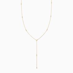 Icy Lariat Necklace | Gold | Product Image | Uncommon James Fine Jewelry Lariat Drop Necklace With Adjustable Chain, Minimalist Delicate Lariat Body Chain, Adjustable Chain Necklace For Layering, Minimalist Adjustable Lariat Body Chain, Fine Jewelry Lariat Necklace With Delicate Chain, Fine Jewelry Diamond Lariat Necklace With Delicate Chain, Elegant Lariat Backdrop Necklace For Layering, Fine Jewelry Lariat Necklace With Dangle Feature, Fine Jewelry Lariat Drop Necklace With Delicate Chain