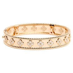 Van Cleef & Arpels Perlée Trèfles (or Alhambra) bracelet, medium model, in yellow gold and diamonds (80 in total for 1.78 carats), invisible ratchet clasp also in yellow gold. Size S for a wrist of 16 cm, bracelet width 1.1 cm. The bracelet comes from Van Cleef & Arpels Paris and it is in perfect condition, delivered with invoice, papers and original box, sublime. Alhambra Bracelet, Gold Vans, Van Cleef & Arpels, Van Cleef And Arpels, Van Cleef Arpels, Diamond Gold, Van Cleef, Full Set, Gold Diamond