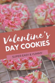 valentine's day cookies with pink and white sprinkles on a cooling rack