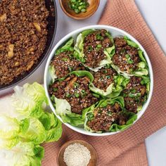 lettuce wraps with ground beef in a bowl next to a skillet of meat