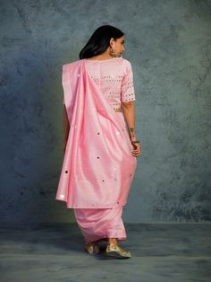 Chanderi saree embellished with mirror work on pleats and pallu, comes along with a matching crop blouse embellished with mirror work. Enjoy the celebrations in this beautiful and unique saree. Color: Light Pink Fabric: Saree & Blouse - Chanderi Lining - Cotton Note: Available in other colors The product will be delivered within 2-4 weeks of order placed Wash Care - Dry clean only Hand Embroidery is zari embedded foil mirrors which are non erosive,unbreakable and light weight Measurements: Saree Unique Saree, Light Pink Fabric, Chanderi Saree, Sustainable Clothing Brands, Shop Light, Womens Clothes, Clothing Stores, Mirror Work, Saree With Blouse