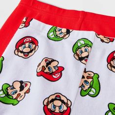 Your kid will be ready to explore the Mushroom Kingdom in their dreams wearing the pieces from the 4-Piece Super Mario Long-Sleeve Cotton Snug-Fit Pajama Set. This set includes two pairs of PJs, with each piece crafted from 100% cotton with ribbed cuffs and ankles for all-night cozy comfort. One pair includes a long-sleeve sleep tee with a Mario and Luigi graphic and red pajama pants, while the other set has a long-sleeve tee and pajama pants that both feature allover Mario and Luigi graphics fo Cotton Character Print Sets For Playwear, Fun Cotton Sets With Cartoon Print, Fun Cotton Sets With Character Print, Cotton Sleepover Sets With Character Print, Cotton Sets With Character Print In Fun Style, White Cotton Sets With Character Print, White Character Print Playwear Sets, White Character Print Sets For Playwear, Red Cartoon Print Cotton Sleepwear