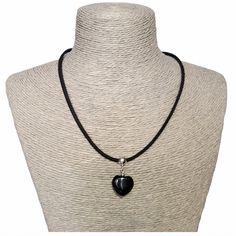 Lightweight and unique, Black Obsidian heart necklace. A gorgeous gift for a Birthday, Valentine's Day, Christmas or any special occasion.  A versatile necklace that can be worn daytime or evening, dress up or dress down. The black semi-precious Rainbow Obsidian heart bead is threaded onto a sterling silver bail and attached to black faux suede cord to make a gorgeous choker style necklace. The necklace fastens at the back with a sterling silver bolt ring clasp and features a 2 inch sterling silver extender chain (with tiny flat heart at the end) to adjust the length. [ All findings are 925 Sterling Silver ] Your necklace will come in an organza bag. [ Please be aware that natural crystals and semi-precious stones often have marks and perceived flaws; these are, in my opinion, part of thei Necklace With Black String, Black Necklaces For Anniversary On Valentine's Day, Black Necklace For Anniversary On Valentine's Day, Valentine's Day Black Necklace For Anniversary, Black Adjustable Heart Charm Necklace, Adjustable Black Heart Pendant Necklace, Adjustable Black Heart Charm Necklace, Black Heart-shaped Gemstone Jewelry, Elegant Adjustable Black Heart Necklace