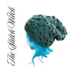 a crocheted hat with blue hair is shown in front of a white background