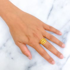 This ring, delicately crafted from 22k yellow gold and weighing 3.0 grams, displays an intricate design that exudes charm and sophistication. Available in size 7, with the option for resizing, it caters to diverse styles and preferences. Ideal for those who appreciate detailed artistry and the timeless allure of gold, this piece enhances any jewelry collection with its refined elegance and captivating detail. Product Details Gold Purity(karat): 22k Gold Weight(grams): 3.0 Item Finish: Yellow Gold Ring Size: ﻿7﻿ Ring Sizing Available: Yes // 22k Yellow Gold Filigree Ring For Anniversary, 22k Gold Filigree Ring With Intricate Design, 22k Yellow Gold Open Ring Jewelry, Yellow Gold 22k Temple Jewelry Rings, 22k Yellow Gold Open Ring, 22k Yellow Gold Temple Jewelry Rings, Temple Jewelry 22k Yellow Gold Rings, Yellow Gold Rings Gift, 22k Yellow Gold Engraved Ring