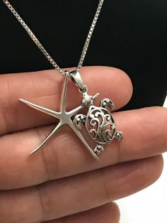 "Sterling Silver Filigree Turtle and Starfish Charm Necklace Great gift for beach lover. Metal: All components are made from solid .925 Sterling Silver Measurement: Turtle height is 25mm (0.98\") and 14mm (0.55\") wide ; Starfish height is 31mm (1.2\") and 21mm (0.83\") wide Choose Chain Length You can find other charm jewelry in my shop here https://www.etsy.com/shop/LinksAndStones?ref=seller-platform-mcnav&section_id=24389019 Please feel free to Convo me with any questions before purchasin Silver Starfish Jewelry For Beach, Silver Starfish Jewelry For Vacation, Silver Jewelry With Starfish Charm For The Beach, Beach Jewelry With Sterling Silver Star, Beach Jewelry In Sterling Silver With Star Shape, Nickel-free Star Jewelry For The Beach, Nickel-free Star-shaped Jewelry For The Beach, Nickel-free Star-shaped Beach Jewelry, April Birthstone Necklace