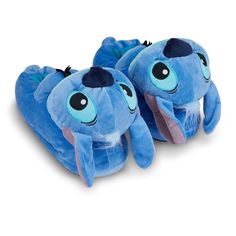 a pair of blue slippers with an elephant on the front and bottom, both have large eyes