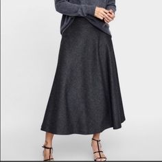 Nwt Zara Dark Gray Herringbone Midi Skirt 4886/255 New With Tag High Waist Midi Skirt Made With Wool Blend. A-Line Silhouette. Back Hidden In-Seam Zip Closure. Side Pockets. Composition 43% Polyester 26% Wool, 1 5% Viscose, 14% Polyamide, 2% Elastane. Approximate Measurement Laying Flat Waist 16” Length 32” Bin 5 Zara Long Skirt For Work, Zara Flared Maxi Skirt, Elegant Zara Skirt For Fall, Zara Flared Lined Maxi Skirt, Zara Flared Maxi Skirt With Lining, Zara Flared Skirt For Workwear, Zara Relaxed Flared Maxi Skirt, Zara Flowy Skirt For Work, Zara Flared Skirt For Fall