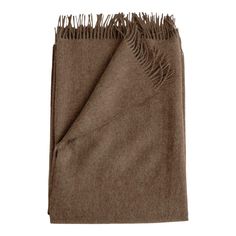 a brown blanket with fringes on it