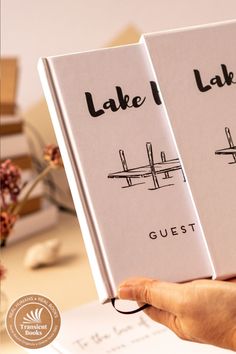 two book covers with the words lake and guest written in black ink on white paper