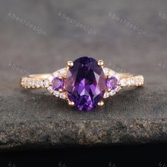 This is a amethyst ring in 14k solid gold ring. This ring is marked S925(silver material) or G10K/14K Main stone is 6x8mm,about 1.6ct. Side stones: CZ + Amethyst The photo shows in 14k yellow gold. I accept custom making order.Please contact me if you need this service. All the jewelry in my store is handmade.It may take 2-3 weeks to finish. For all the jewelries,there is a 14 days money back guarantee.You can return it in the time frame without any questions.However there maybe handcrafted fee 14k Gold Ring With Purple Center Stone, Purple 14k Gold Rings For Anniversary, Purple 14k Gold Ring With Center Stone, Purple 14k Gold Anniversary Rings, Purple Diamond Ring In 14k Gold For Anniversary, Purple Birthstone Ring With Center Stone In 14k Gold, Purple 14k Gold Promise Ring, Purple Oval Rings For Anniversary, Purple Cluster Ring For Anniversary In Fine Jewelry