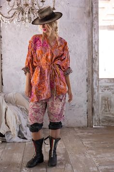 Made with premium European cotton, this kimono boasts unique patchwork construction and metal snaps for easy wear. Adorned with charming appliqué fairies, fancy cats, and bunnies at a picnic, each piece is hand-faded, distressed, patched, mended, and stitched for a one-of-a-kind look. Complete with ribbon ties at the front for added style and convenience. 100% Cotton Wash in Cold Water, Delicate Dry or Hang to Dry One Size Fits Most Style: Jacket 964 in Marmalade Please note: This item is not eligible for discounts, loyalty reward redemption, or promotions. For returns, item needs to be returned with all original tags. Cats And Bunnies, Kedem Sasson, Rosé Sister, Fancy Cats, Magnolia Pearl, Co Design, A Picnic, Marmalade, Ribbon Tie