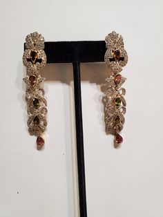 "You are viewing a beautiful set of Vintage 14k solid gold & sterling silver multicolored tourmaline stones and diamond necklace and earrings set. The earrings measures approx.2 7/8 inches long x 5 /8 inches wide. The earrings total weight is approx.20.79 grams. The diamond total weight approx. 1.50ctw While the multicolored tourmaline stones is 3.02 ctw. This earrings is tested 14k yellow and white gold. The earrings is very unique and the diamond are sparkly its merge with all the differen Diamond Necklace And Earrings Set, Diamond Necklace And Earrings, Tourmaline Stone, Necklace And Earrings Set, Filigree Ring, Stunning Necklace, Necklace And Earrings, Earrings Set, Ring Gift