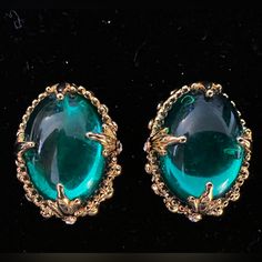 Vintage Mvh Princess Michaela Von Habsburg Gold Tone Clip Earrings 1980s Crown Jewel Collection Tiny Clear Rhinestones On Edges Large Emerald Green Glass Center Stamped “Mvh” Crown Jewels, Clip Earrings, Clear Rhinestones, Green Glass, Emerald Green, Clip On Earrings, Gold Tones, Emerald, Jewelry Earrings