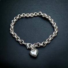 Silver bracelet with silver heart pendant 7 inch Classic Heart-shaped Bracelets With Sterling Silver Clasp, Classic Silver Heart Bracelet, Classic Heart Shaped Sterling Silver Bracelet, Classic Silver Heart Charm Bracelet, Classic Silver Heart Shaped Bracelets, Classic Silver Heart-shaped Bracelet, Classic Gold Heart Charm Bracelet, Classic Silver Heart Bracelet With Lobster Clasp, Silver Heart Bracelet With Sterling Silver Clasp