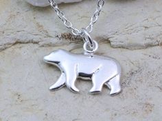 Sterling silver polar bear, please choose your sterling silver chain style and length from the drop down menu . Looking to add more Charms:  http://etsy.me/1N6OX3R . More Meaningful Jewelry: http://www.JewelrywithAMeaning.etsy.com DETAILS: Solid 925 Sterling silver Pendant.   10.5 x 19 mm Solid 925 Sterling Silver chain, select your length from the menu. I offer fine jewelry made out of 92.5% Sterling Silver, fine jewelry can last for generations, and it is often considered an investment or some White Polar Bear, Sterling Silver Cleaner, Silver Bear, Bear Necklace, Bear Pendant, Silver Chain Style, Meaningful Jewelry, Necklace White, 925 Sterling Silver Chain