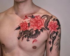 a man's chest with flowers and a snake on it