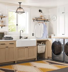 a washer and dryer in a small room