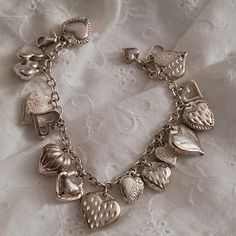 17 Heart Charms In A Rolo Bracelet, No Signs Of Wear Lobster Claw Clasp Signed Jacmel Mauritius- Jcm Solid Sterling Silver (Not Plated) 8 Inches In Length Sterling Silver Heart, Mauritius, Heart Charm Bracelet, Charm Bracelets, Silver Heart, Lobster Claw, Vintage Sterling Silver, Womens Jewelry Bracelets, Heart Charm