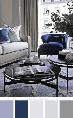 a living room with two couches and a coffee table in front of a window