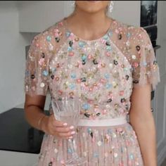 Bhldn Needle & Thread Dress $600 Size Us 4-- Runs Small-- Please See Measurements Bust- 32 Inches Waist- 26 Inches Length- 45 Inches Selling In Pink With Colorful Sequins-- Also Shown In Other Colors Open Back Beautiful Brand New, Never Worn, Only Tried On This Is My Lowest Price, Thanks! Don't Forget To Check Out My Other Bhldn And Needle & Thread Dresses! Glamorous Short Sleeve Maxi Dress For Spring, Elegant Embellished Dress For Garden Party, Summer Embellished Dress For Wedding Guest, Spring Wedding Guest Dress With Sequins, Spring Embellished Dress For Wedding Guest, Spring Sequin Maxi Dress With Short Sleeves, Pink Floral Embellished Maxi Dress For Parties, Embellished Short Sleeve Evening Dress For Spring, Needle And Thread Dresses