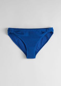 Bikini briefs with a textured, terrycloth-inspired finish. Featuring loop details at the sides for a gently gathered silhouette. Blue Textured Stretch Swimwear, Flat Heel Boots, Knit Outerwear, Linen Sweater, Boot Socks, Fashion Story, White Summer, White Outfits, Terry Cloth