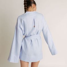 PRODUCT DETAILS Experience the epitome of beachside with the Lagoon Linen Robe. Perfect for a walk along the shore, relaxing by the pool or city stroll. Crafted from 100% linen. Blend of timeless style and comfort. Designed in New York City. Sustainably made in Bosnia & Herzegovina. FIT & SIZING Long, wide sleeves for a relaxed fit. Short, above-the-knee lenght. Model is 179cm / 5’ 101/2’’ and wears size S/M. FABRIC & CARE 100% high-quality linen 30°C machine wash. Do not tumble dry. Do not wrin Bosnia Herzegovina, Linen Robe, Wide Sleeves, Pure White, The Pool, A Walk, Above The Knee, Timeless Style, Fabric Care