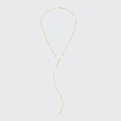 LANA Y-drop chain necklace. 14-karat yellow gold flat link chain. Approx. 16"L; 7.1"L drop. Lobster clasp. Imported. Formal Long Drop Chain Necklace, Gold Lariat Necklace With Long Drop Chain, Modern Gold Long Drop Necklace, Elegant Figaro Chain Lariat Necklace, Elegant Figaro Lariat Chain Necklace, Yellow Gold Dangle Backdrop Necklace With Adjustable Chain, Formal Long Drop Delicate Chain Necklace, Gold Figaro Chain Lariat Necklace, Gold-tone Lariat Chain Necklace